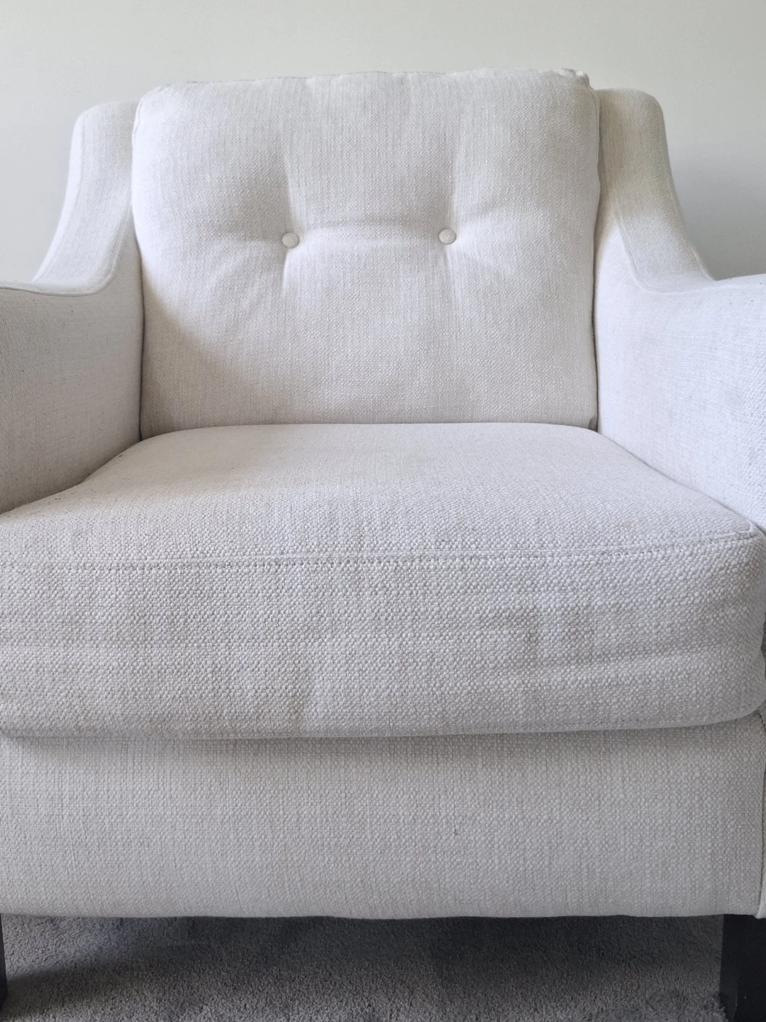 White accent chair with tufted back