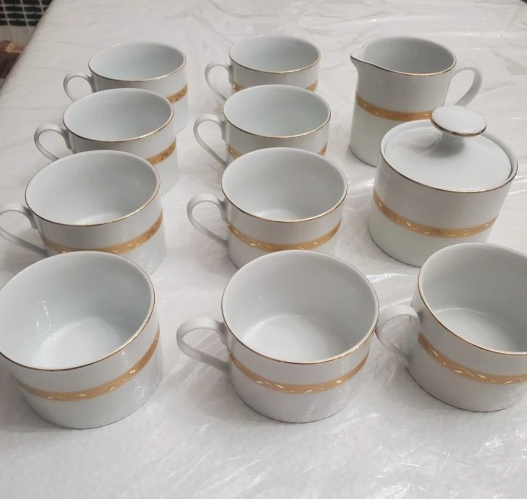 11 new in box gold plated porcelain teacups