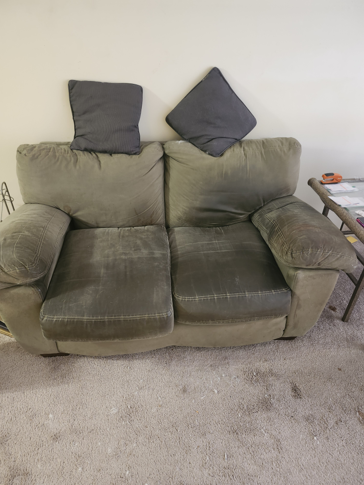 Sofa with two grey cushions