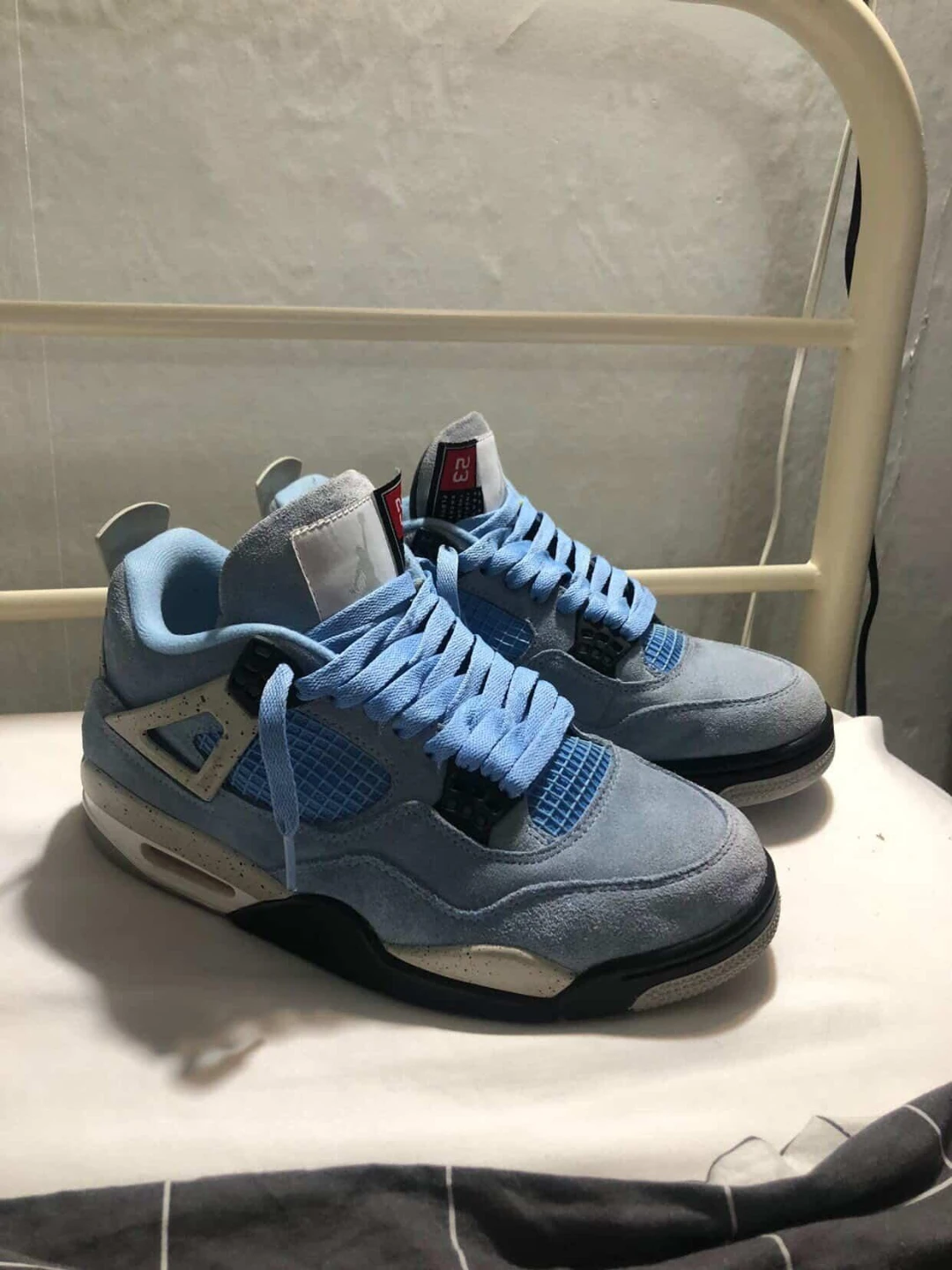 Air Jordan 4 Retro University Blue Sneakers