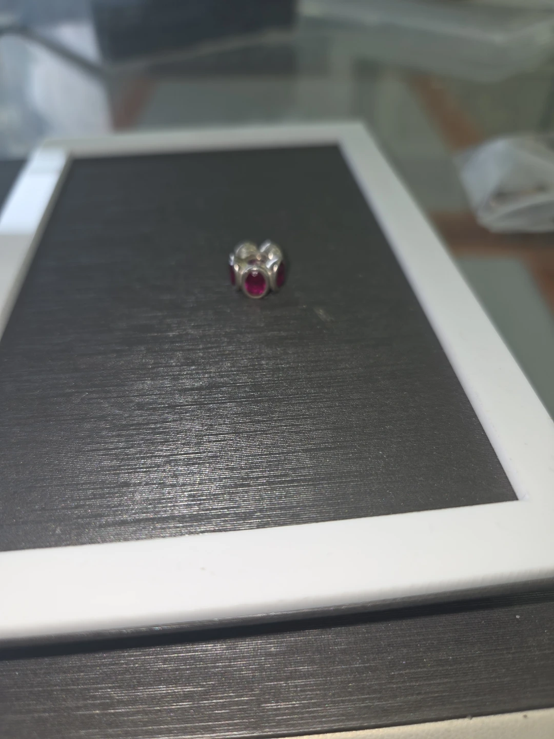 Silver Charm with Red Stones