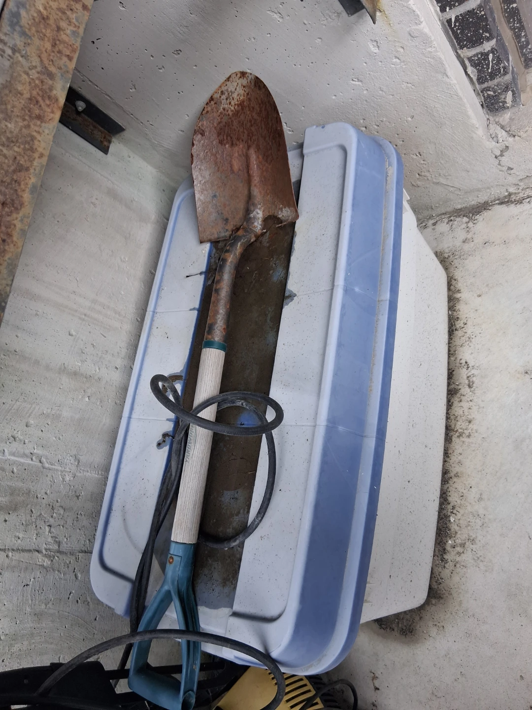 Rusted Garden Shovel with Wooden Handle