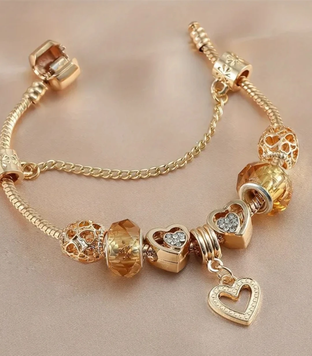 Gold tone multi-strand bracelet with charms - photo 2