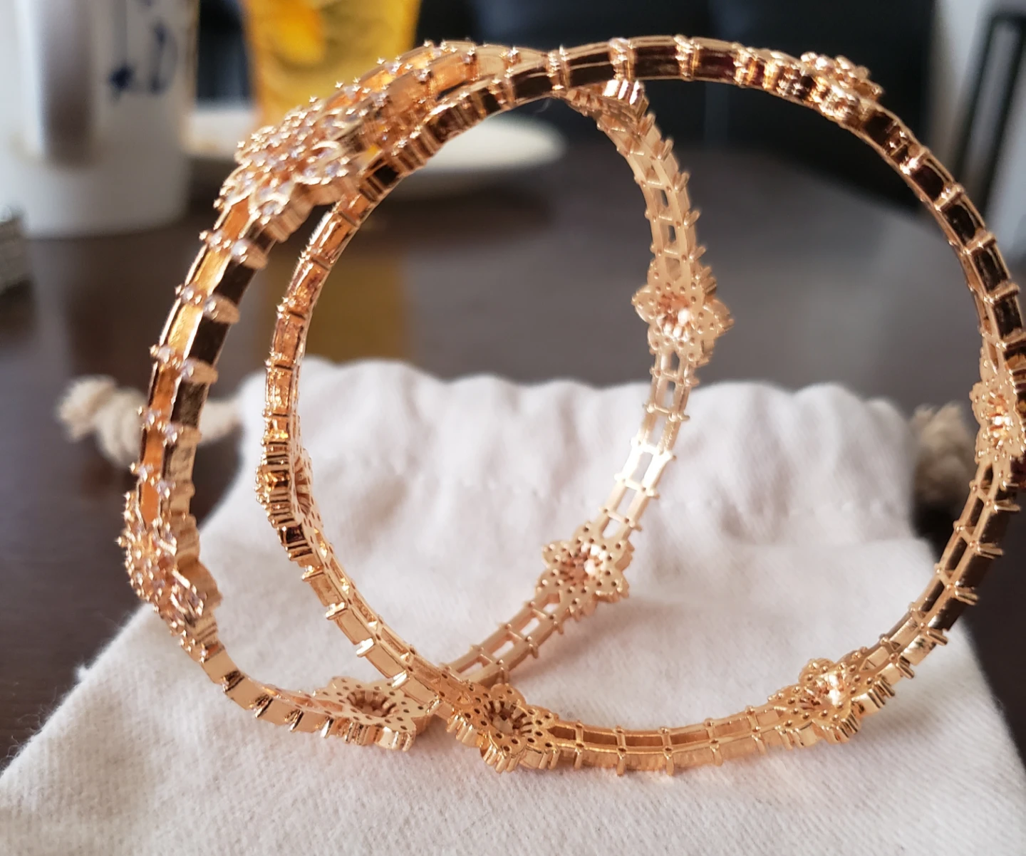 Gold-toned bangles with floral design and rhinestones - photo 2
