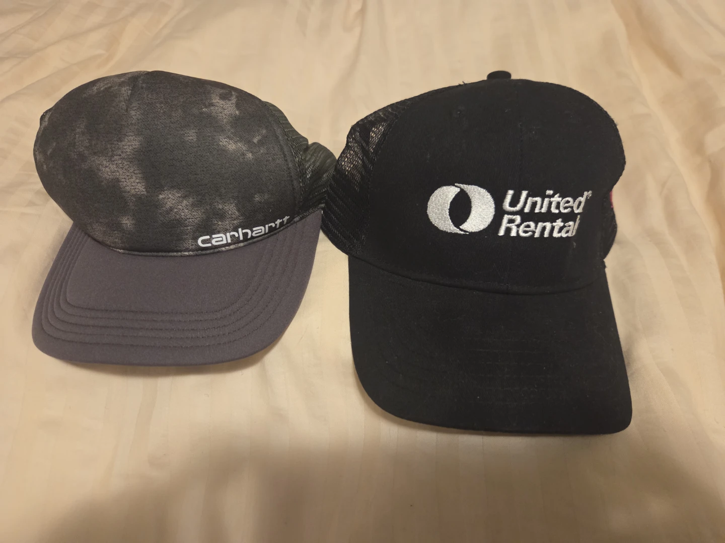 Carhartt and United Rental trucker hats