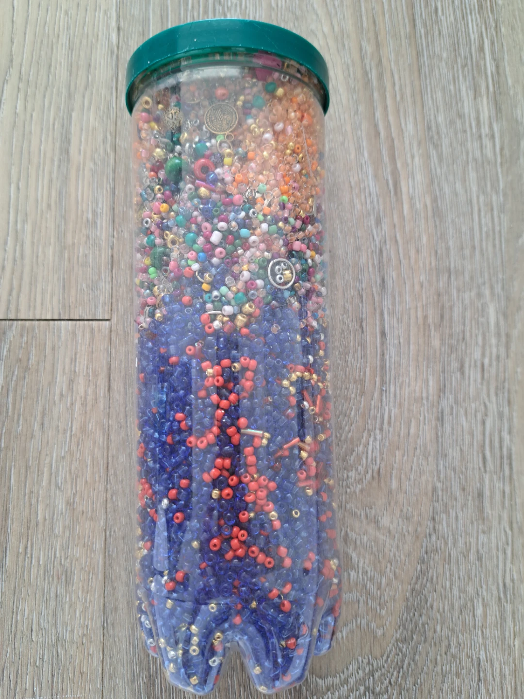 Bottle of Mixed Craft Beads and Charms