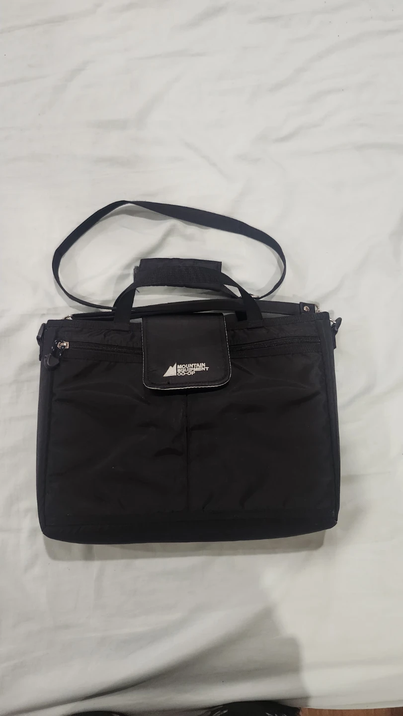 Mountain Equipment Co-op black messenger laptop bag