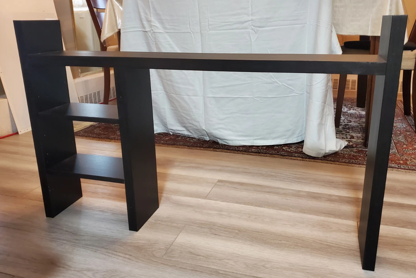 Ikea work table black color shelf.
