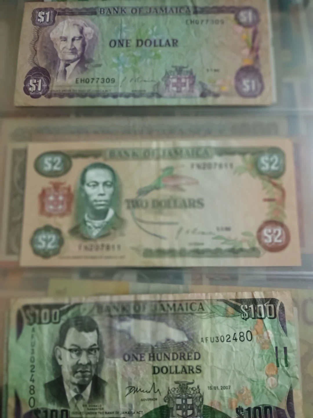 Bank of Jamaica Bills - $1, $2, and $100