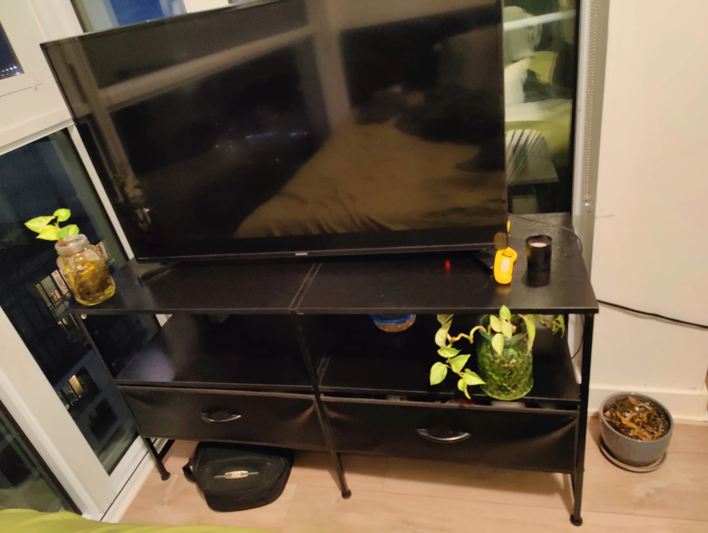 Black TV and the stand - photo 2