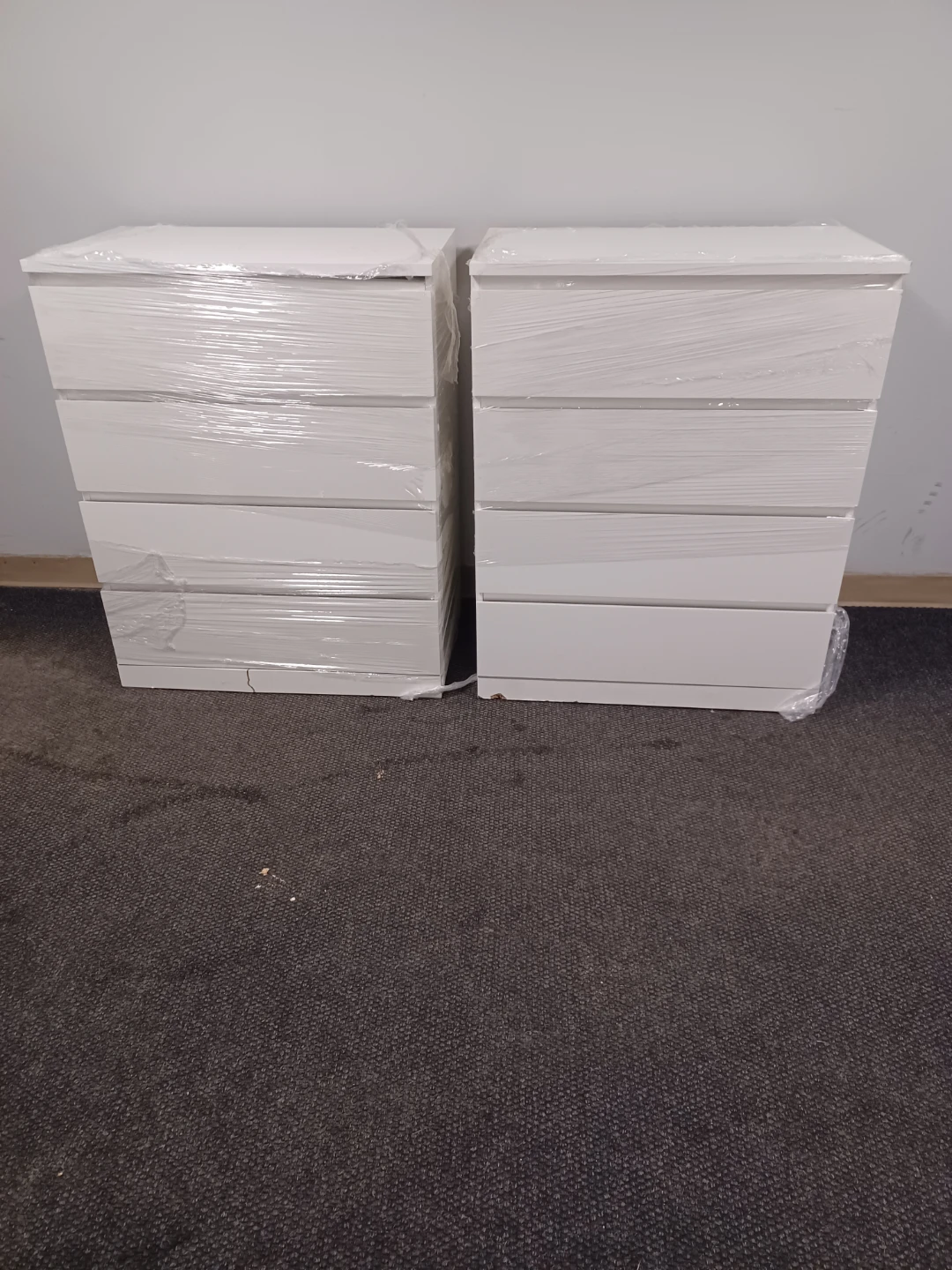 Two white chest of drawers