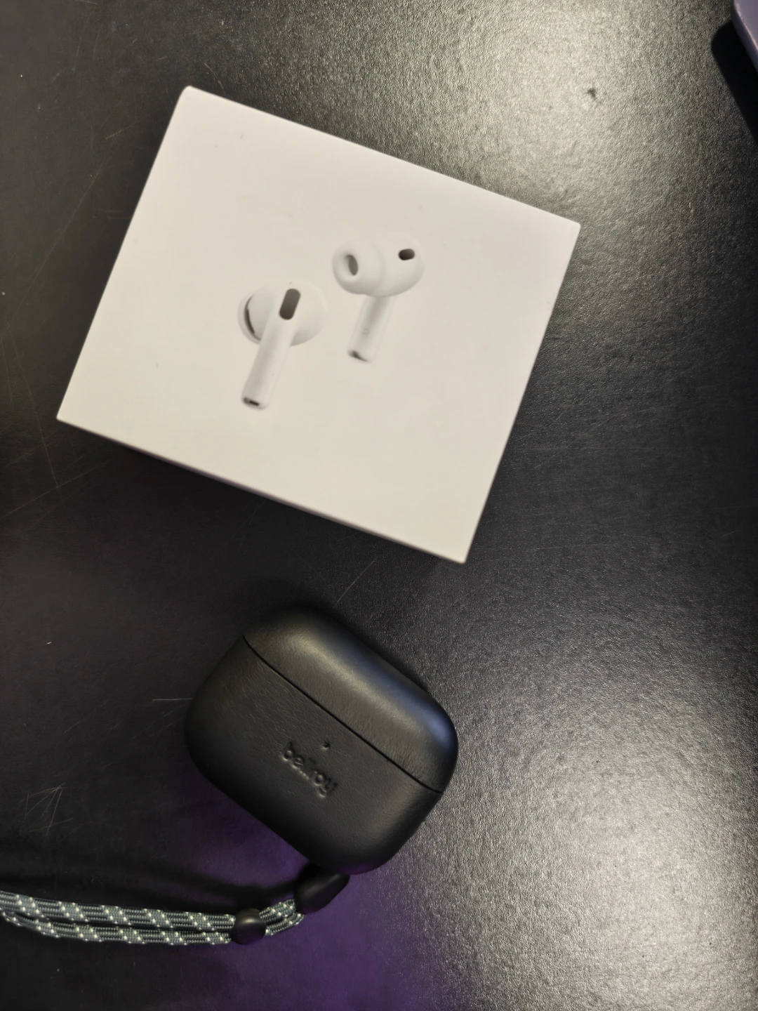 AirPods Pro 3 with a Bellroy leather case