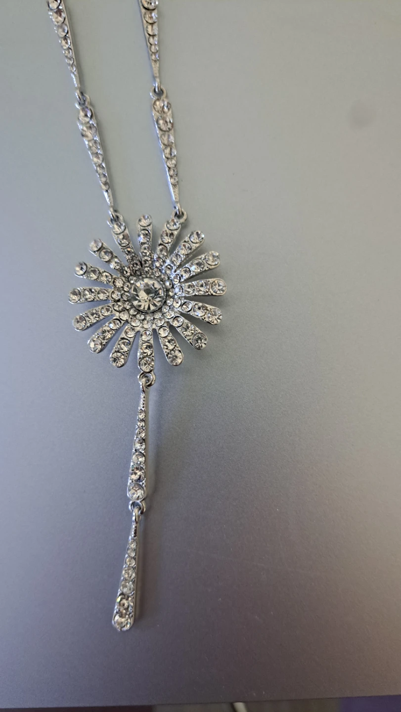Silver tone lariat necklace with sunburst pendant - photo 2