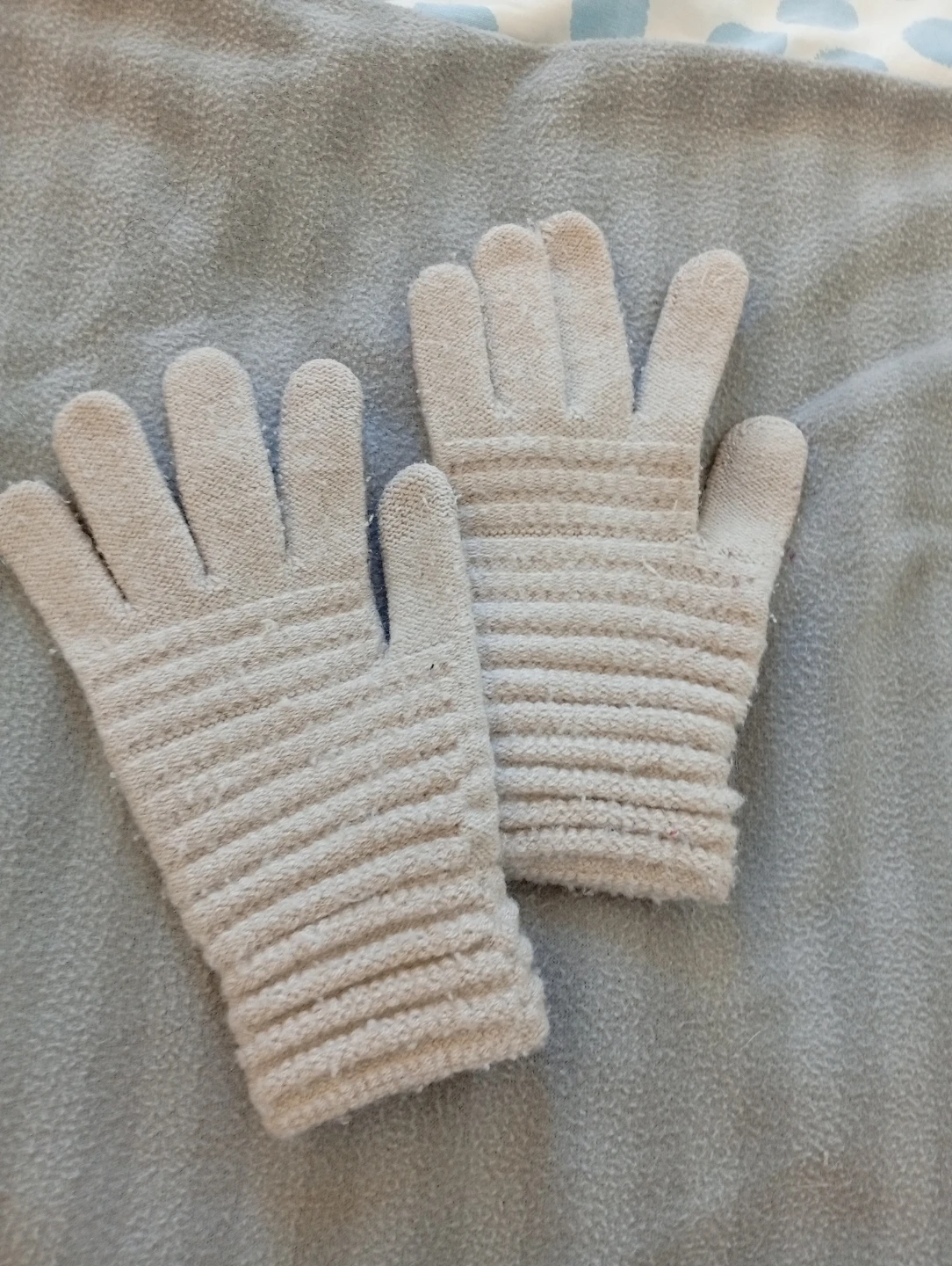 Pair of Beige Knit Gloves and Black Fleece Gloves - photo 2