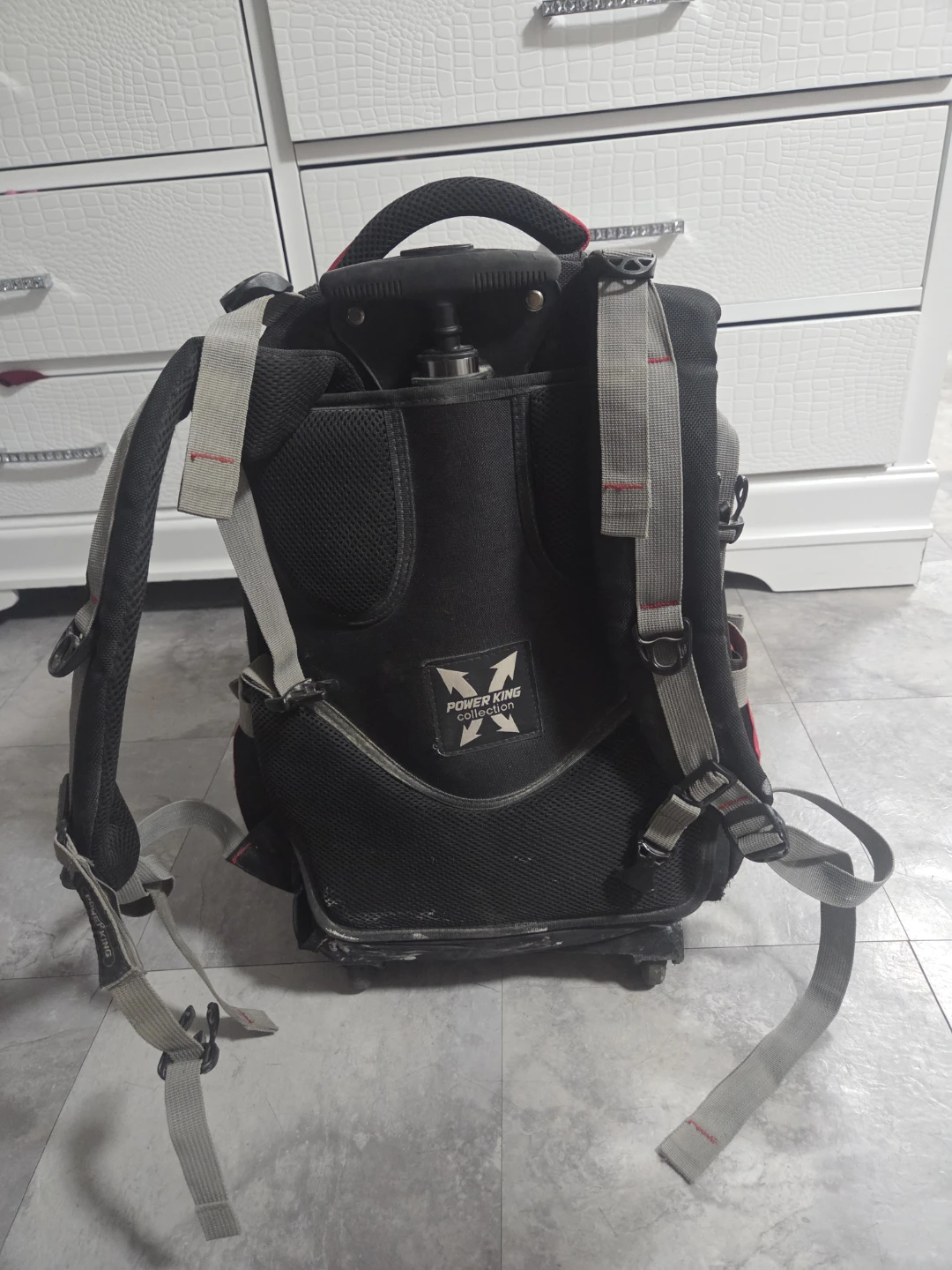 Power King Rolling Backpack