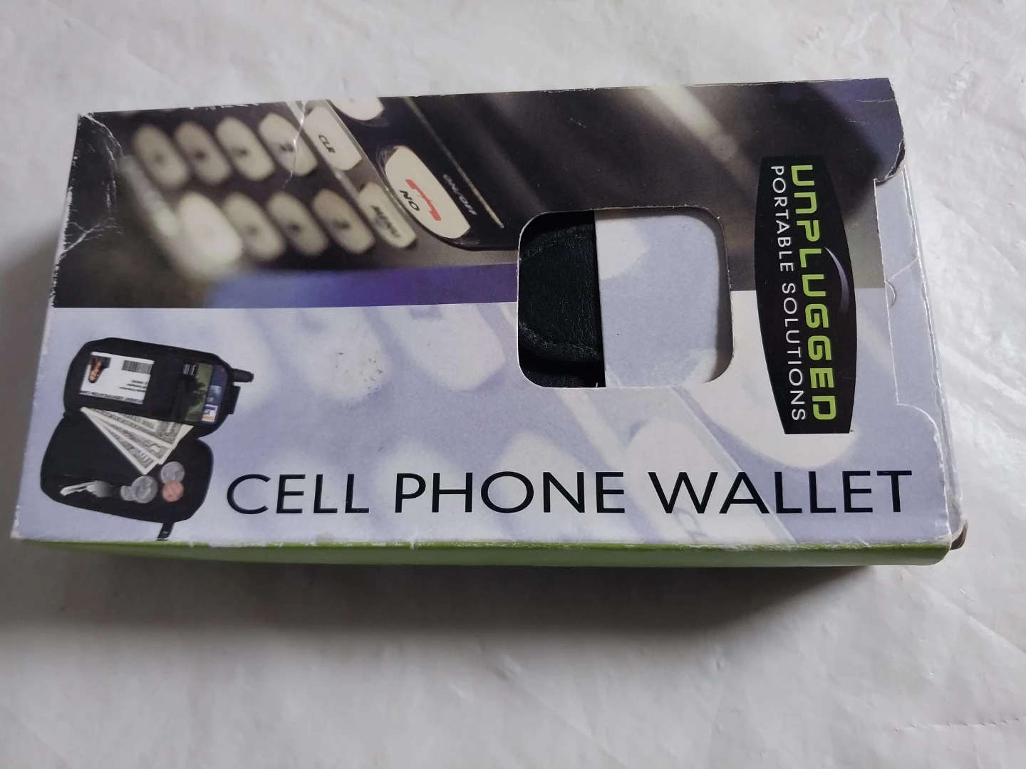Unplugged Portable Solutions Cell Phone Wallet. Pick up only.