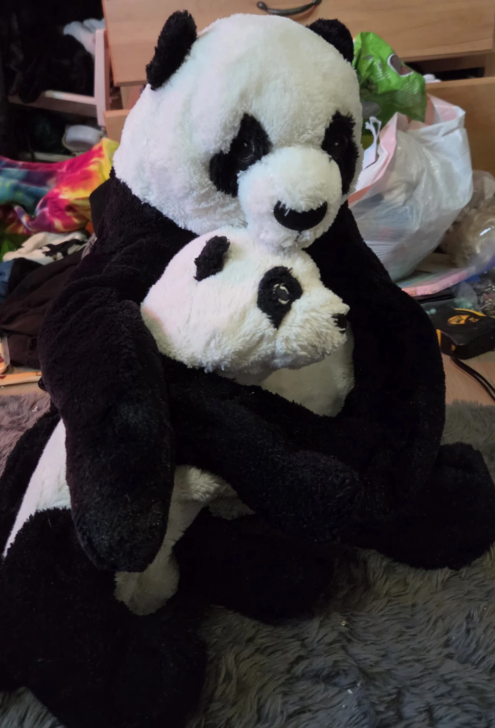 Mom and baby panda plushies