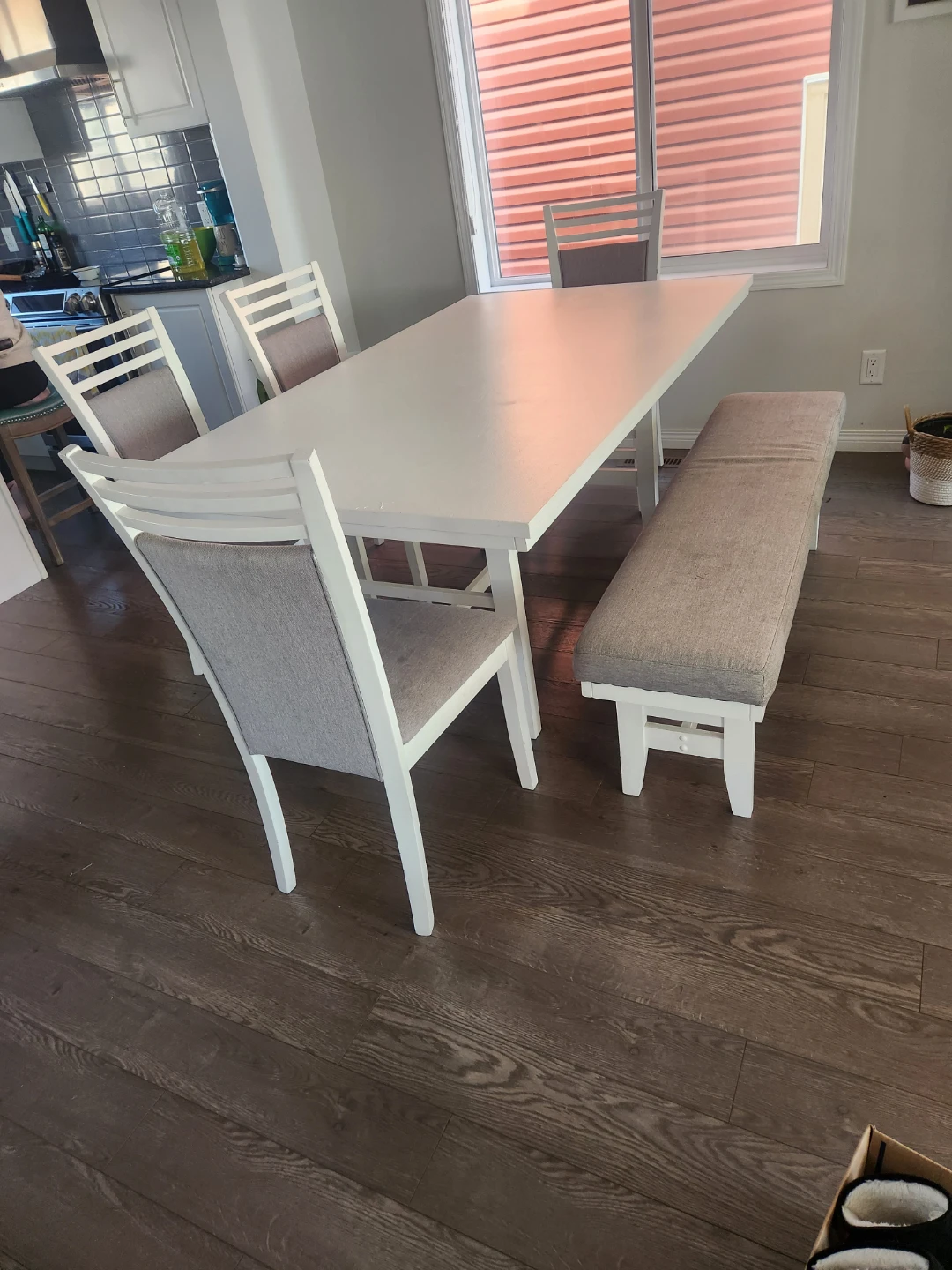 White Dining Table with Grey Upholstered Chairs and Bench
