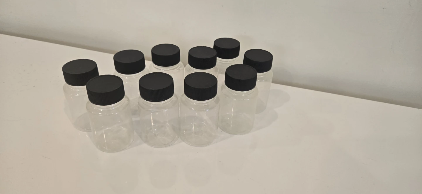 Set of 10 clear small plastic bottles