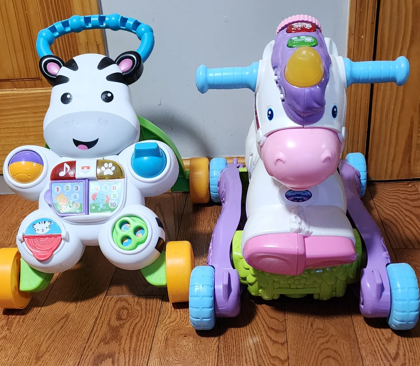 Fisher-Price Zebra Walker and Unicorn Ride-On