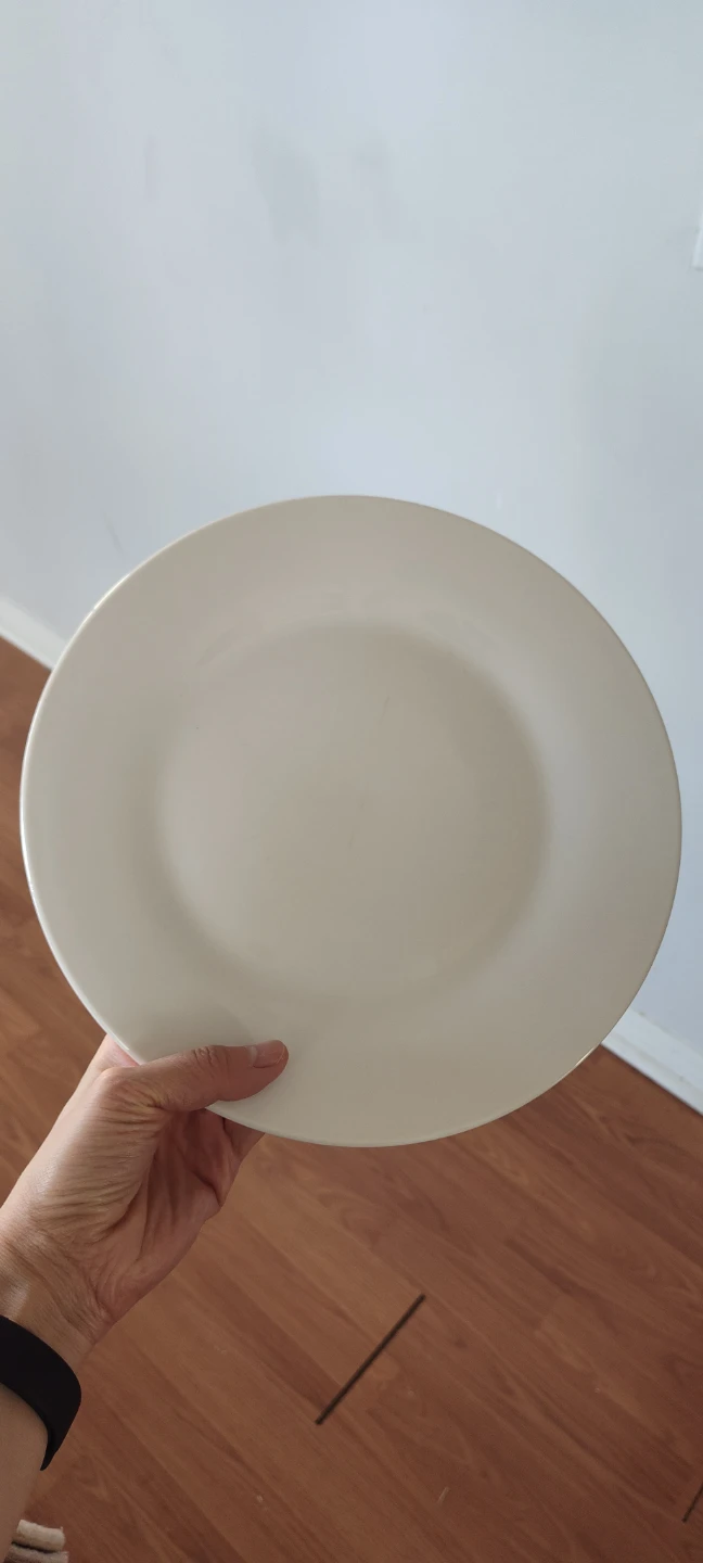 Cream coloured dinner plate