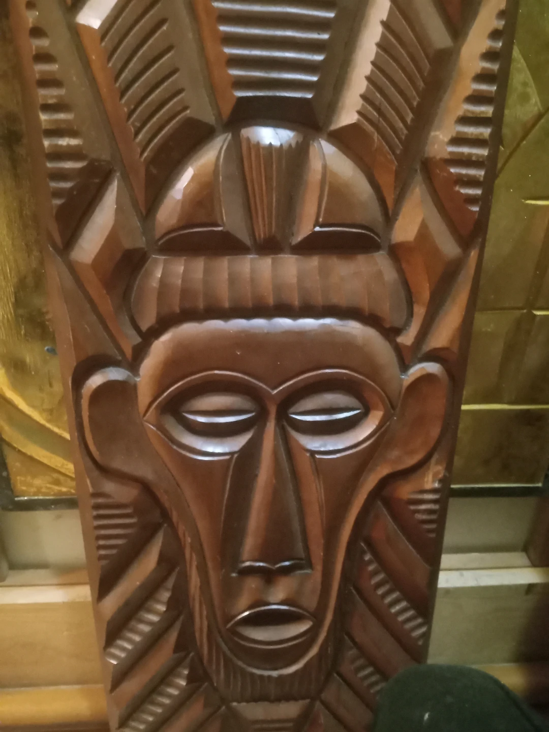 Carved wooden portrait of The Monkey King