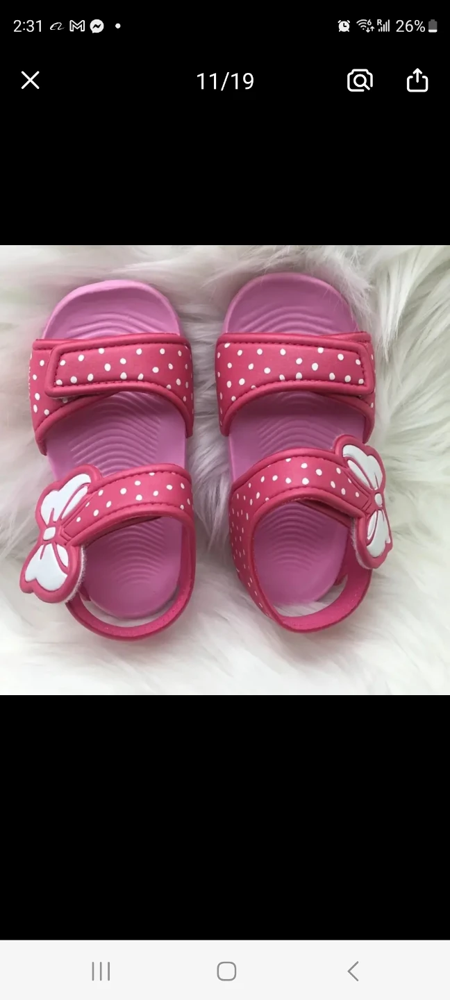 Pink polka dot sandals with bows