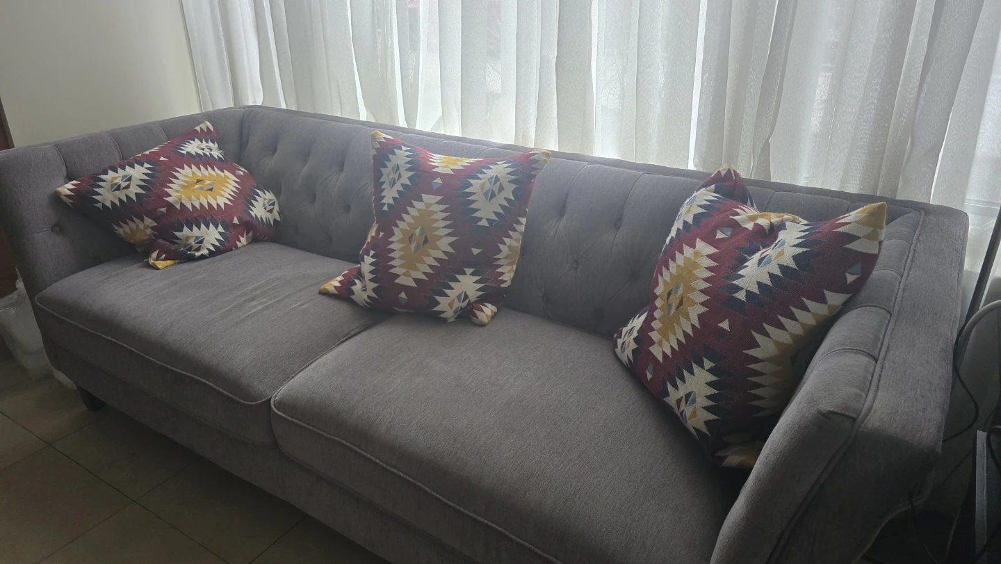 Grey Tufted Sofa (pillow not included)
