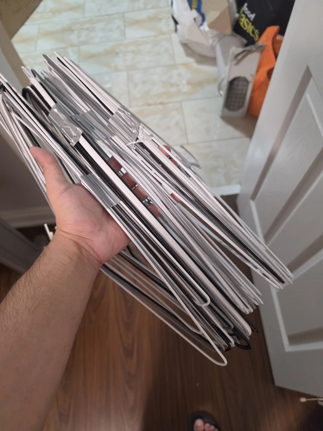 Bundle of metal hangers - photo 2