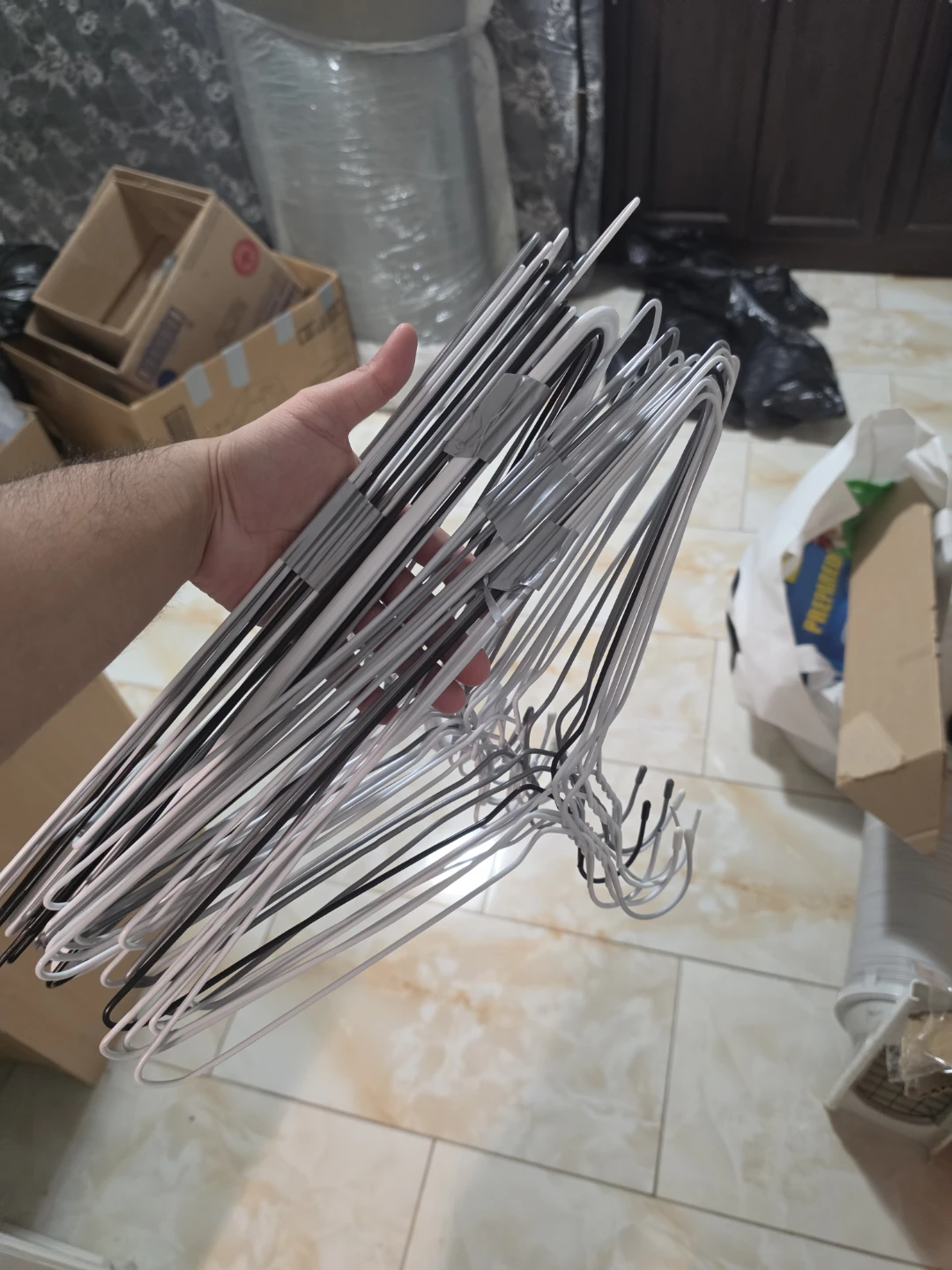 Bundle of metal hangers - photo 3