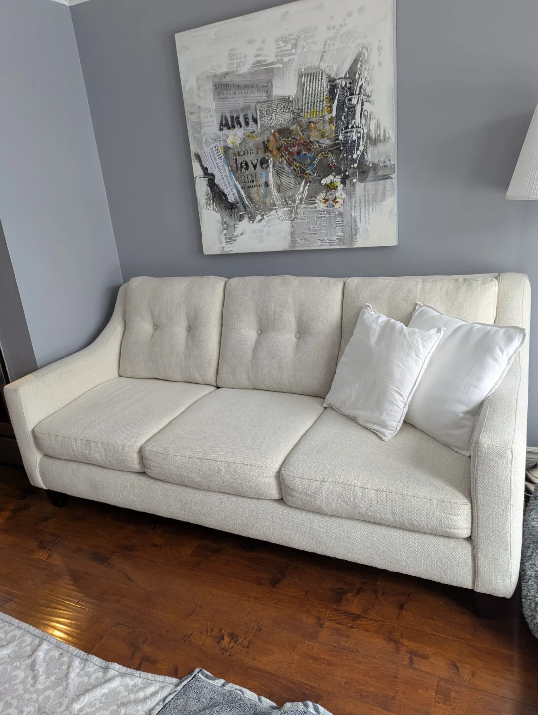 Cream coloured 3-seater sofa