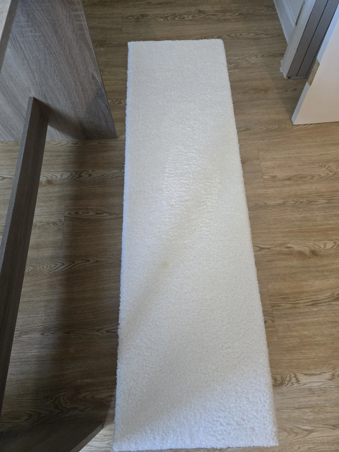 Wood grain dining table with white bench - photo 2