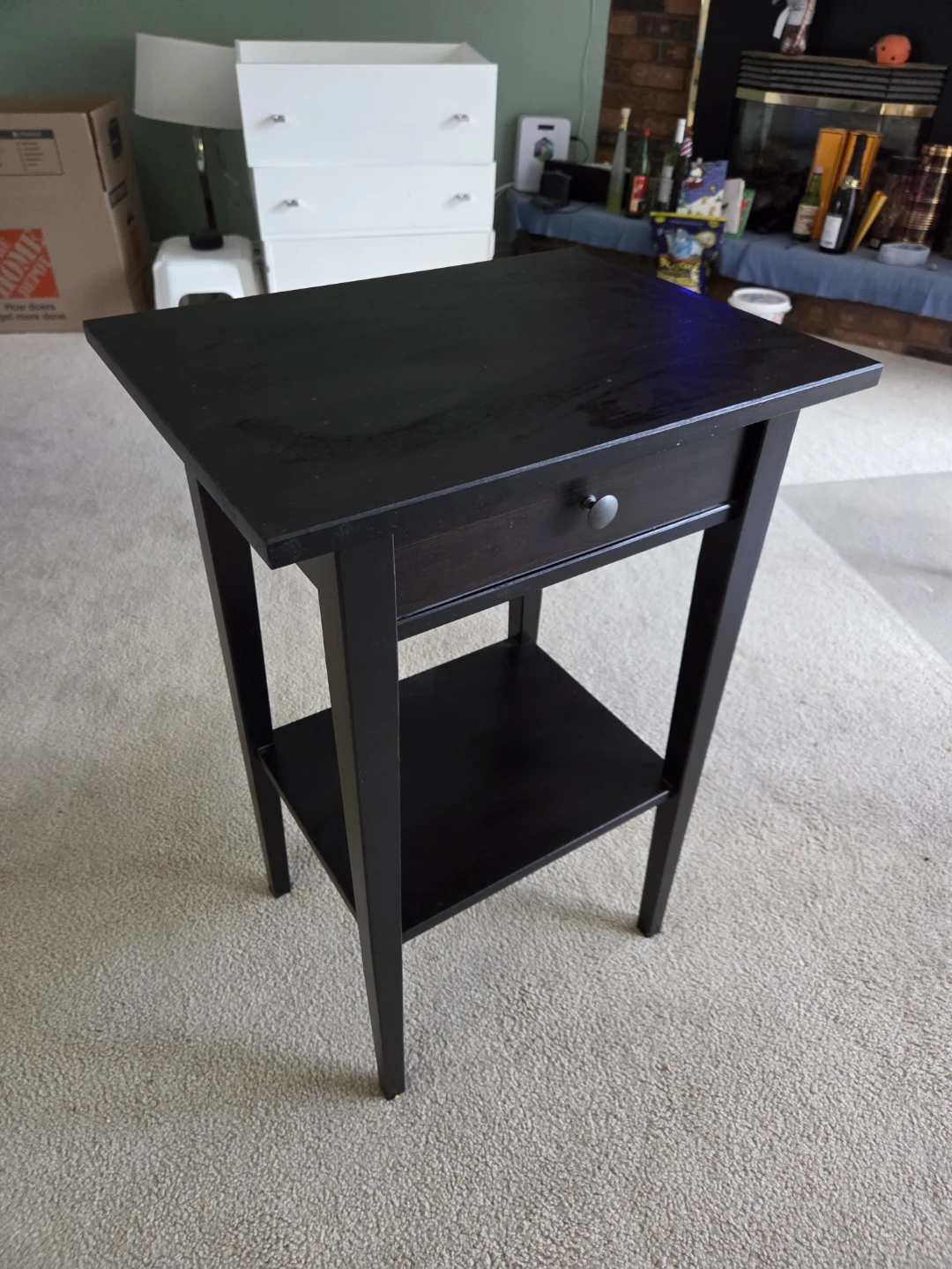 Black accent table with drawer