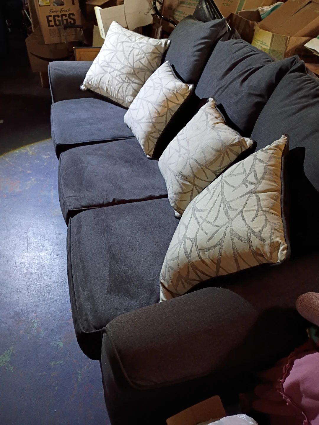 DARK BLUE SOFA WITH DECORATIVE ACCENT THROW PILLOWS