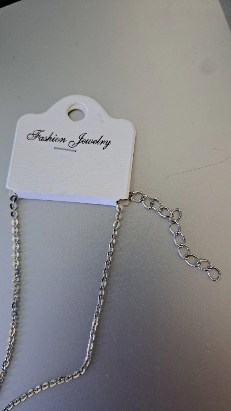 Silver tone lariat necklace with sunburst pendant - photo 3