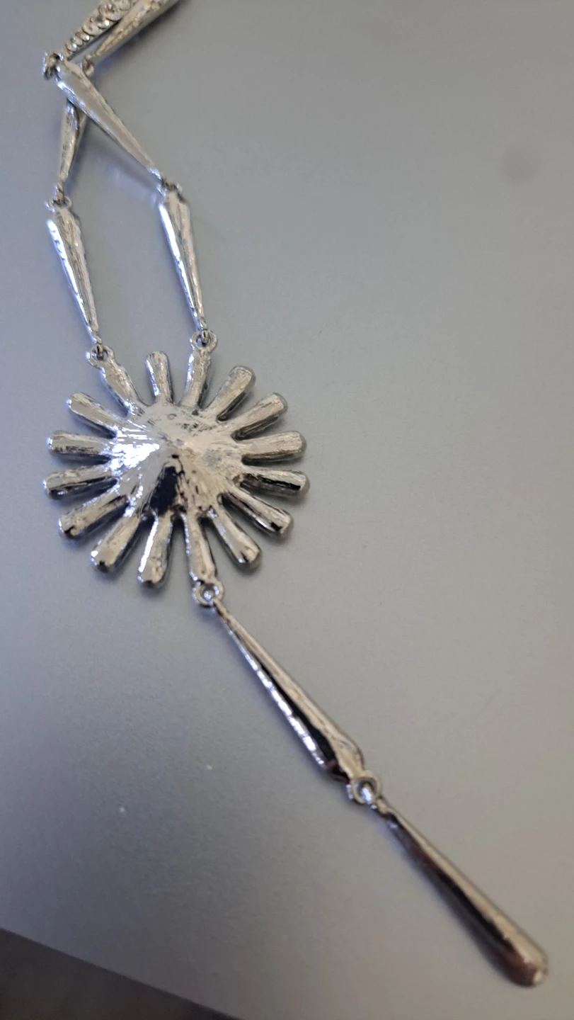 Silver tone lariat necklace with sunburst pendant - photo 4