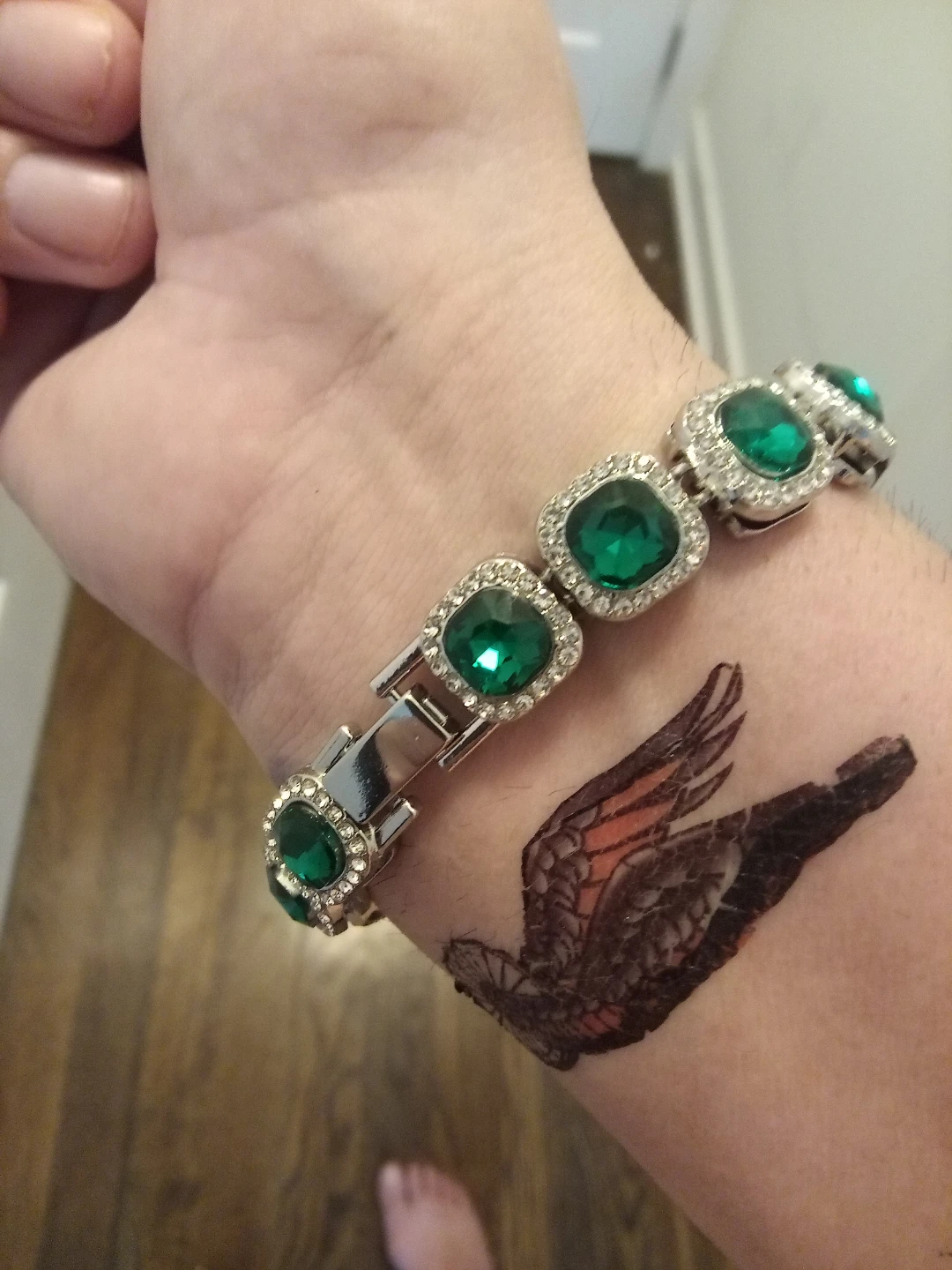 Emerald Green Tennis Bracelet with Silver Accents