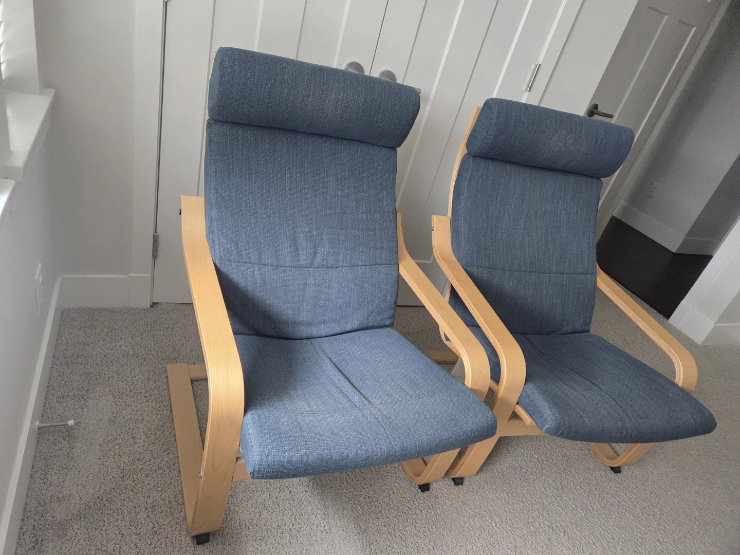 Two Blue Upholstered Lounge Chairs