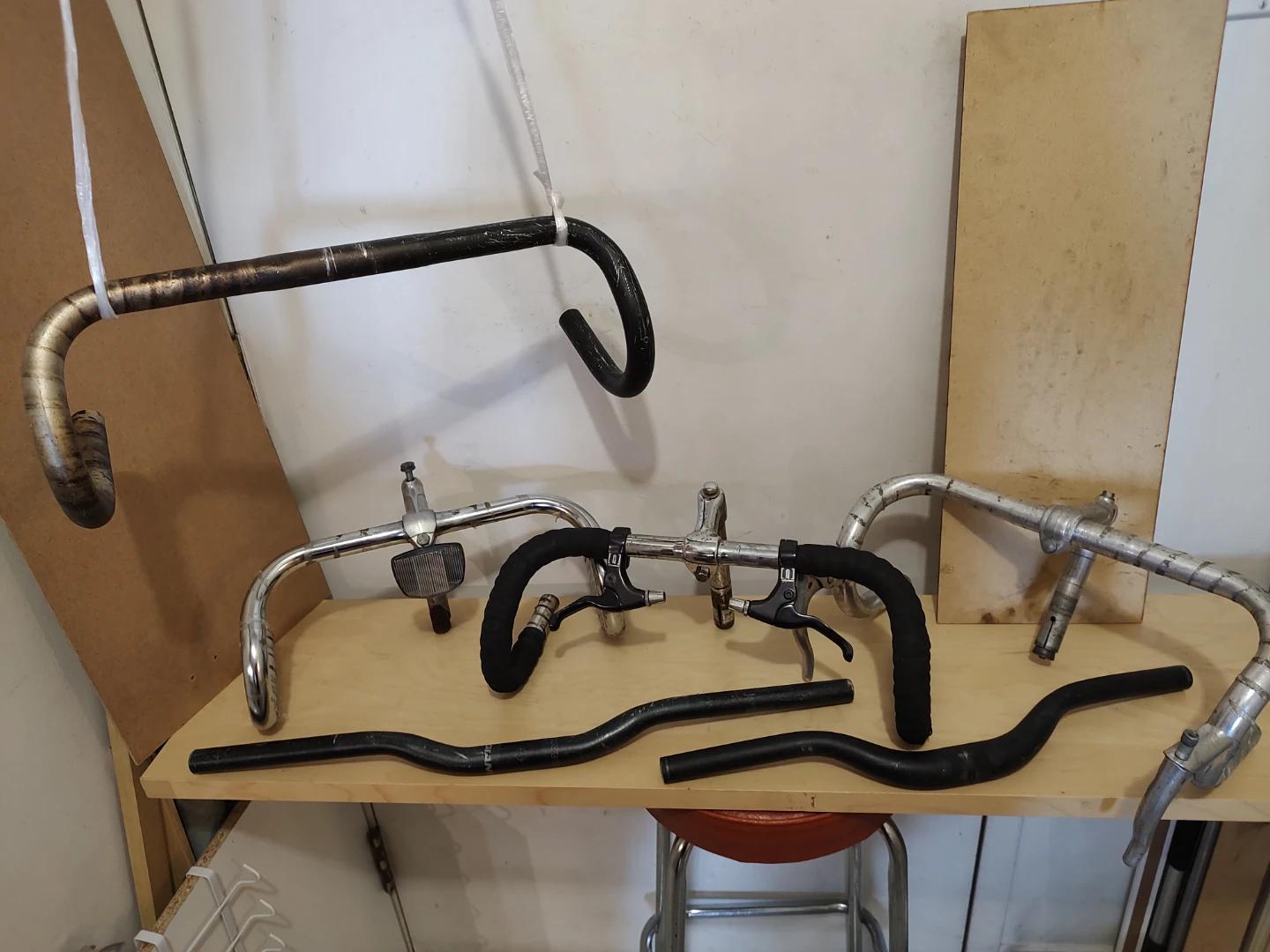 Different handlebars, stems, brake levers and other bike parts