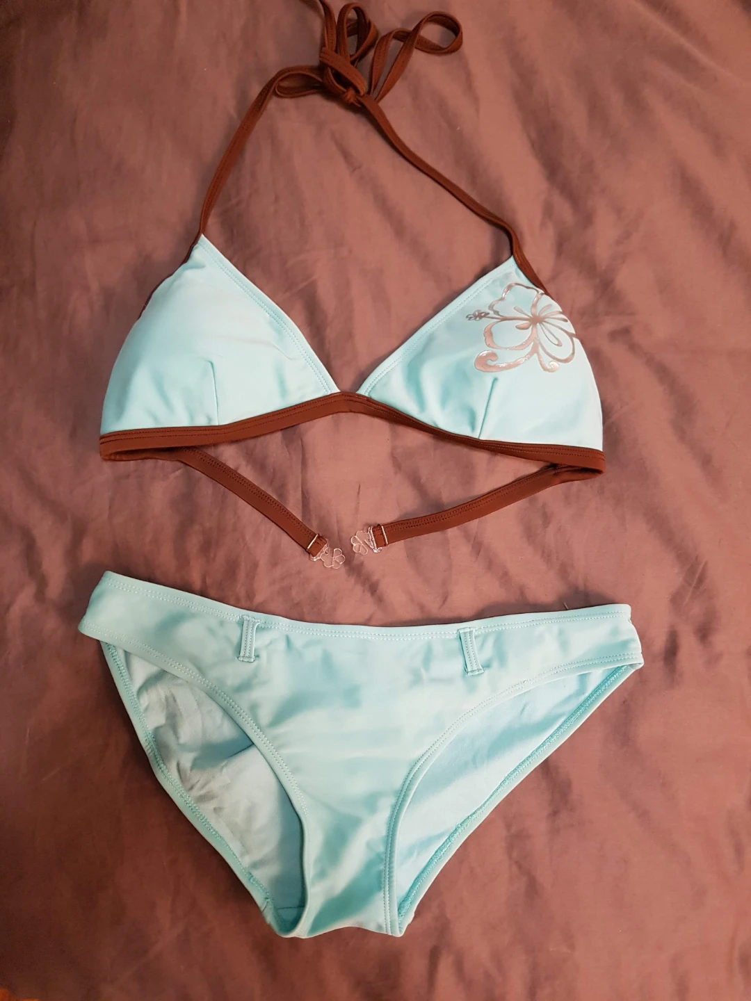 Light Blue Bikini with Brown Trim and Flower Accent medium
