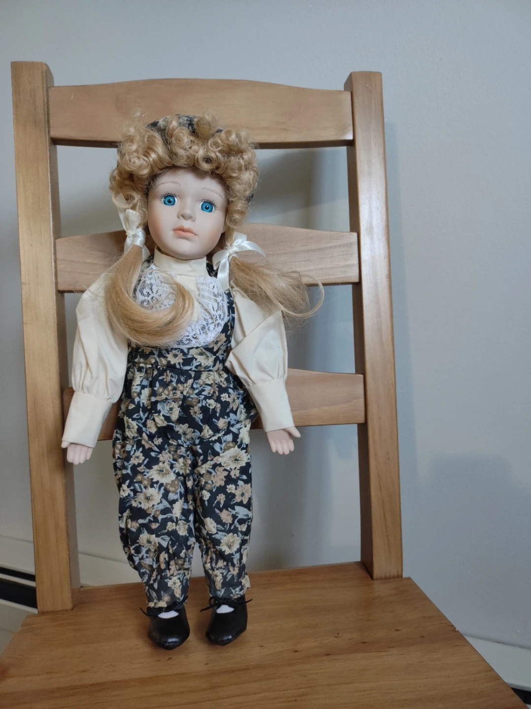Vintage Porcelain Doll with Floral Outfit
