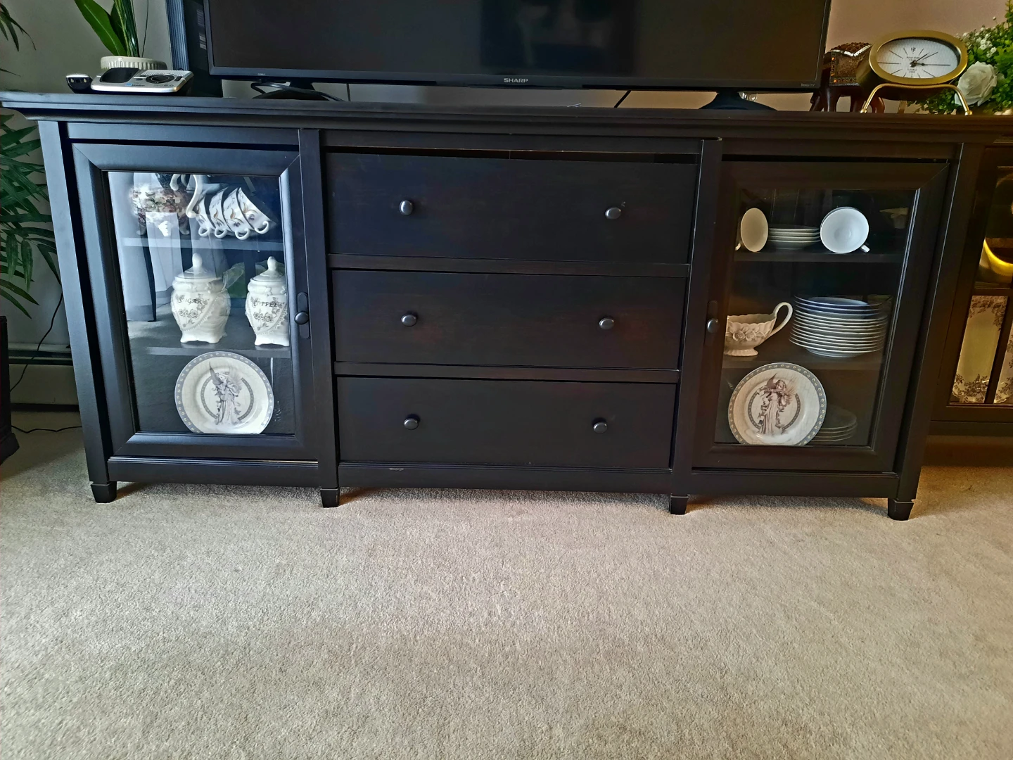 Dark brown wood credenza/TV stand