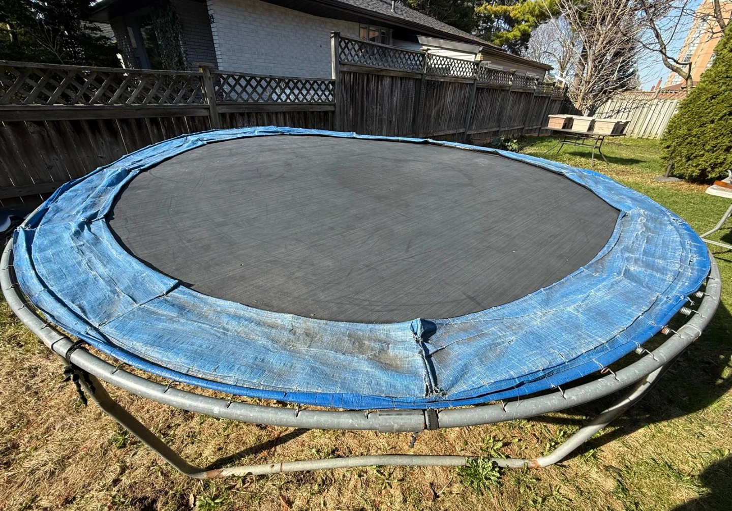 Large Used Trampoline with Blue Safety Pad - photo 2
