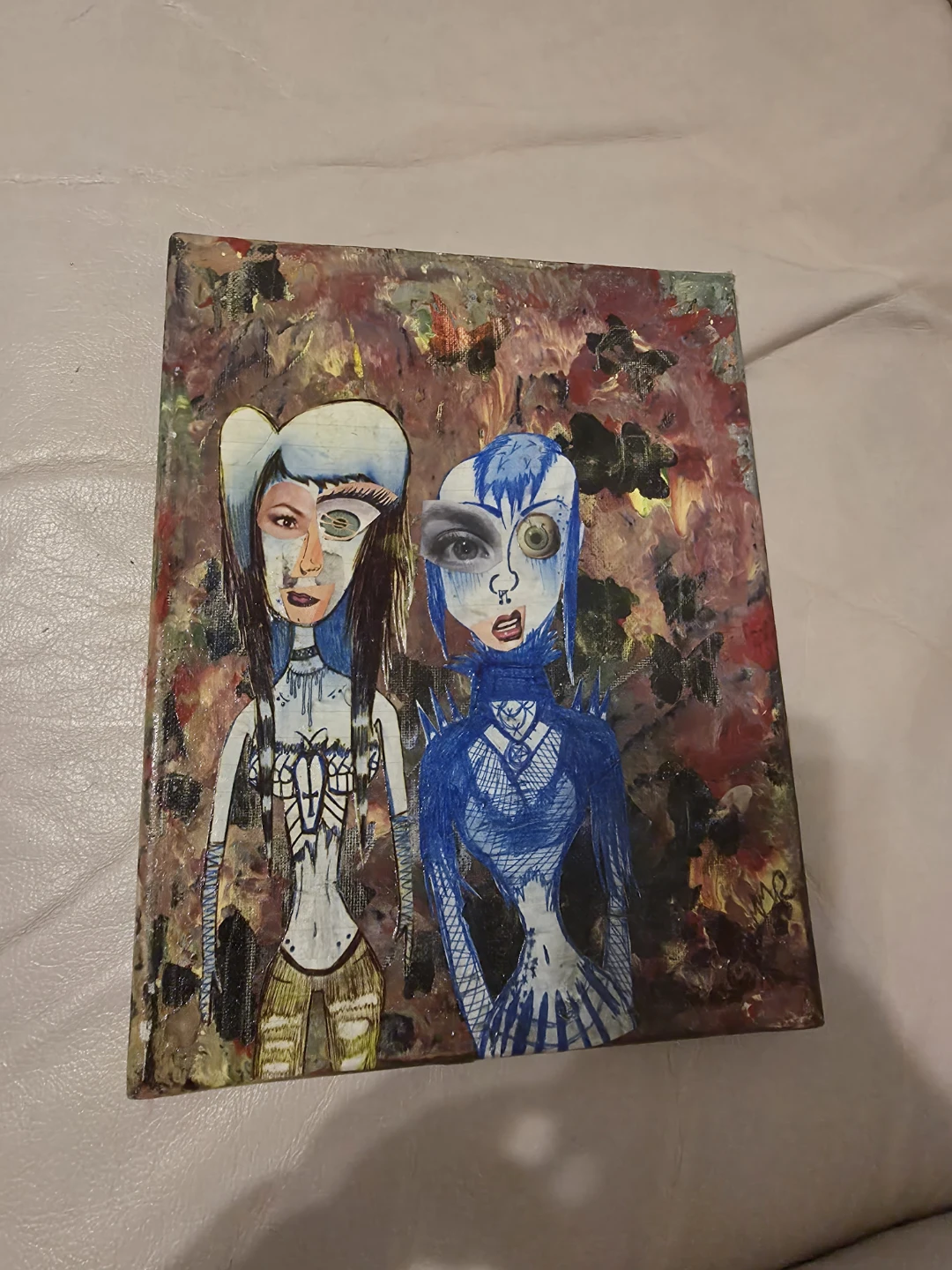 Two girls painting and collage