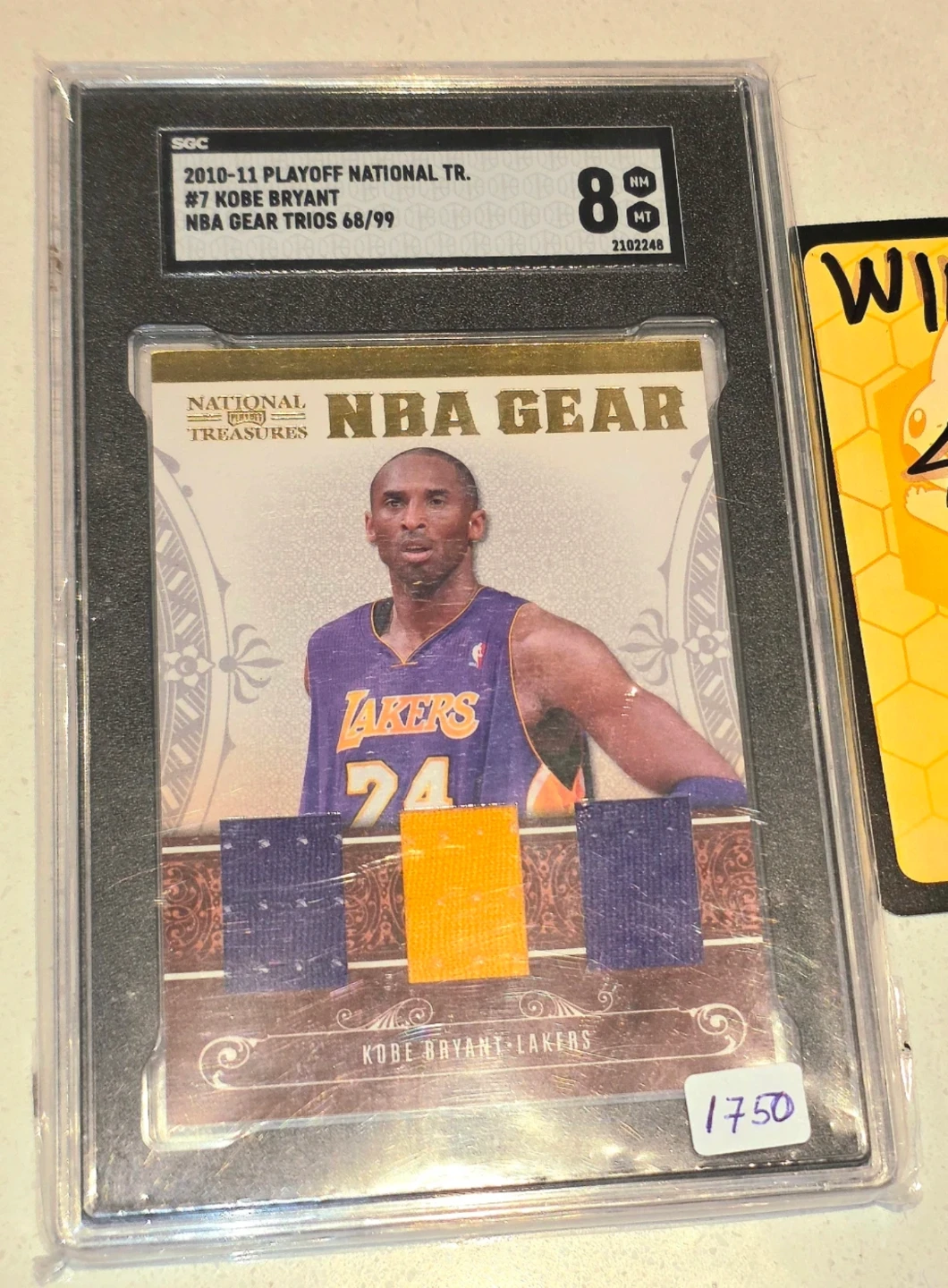 2010-11 National Treasures Kobe Bryant NBA Gear Trios Card 68/99