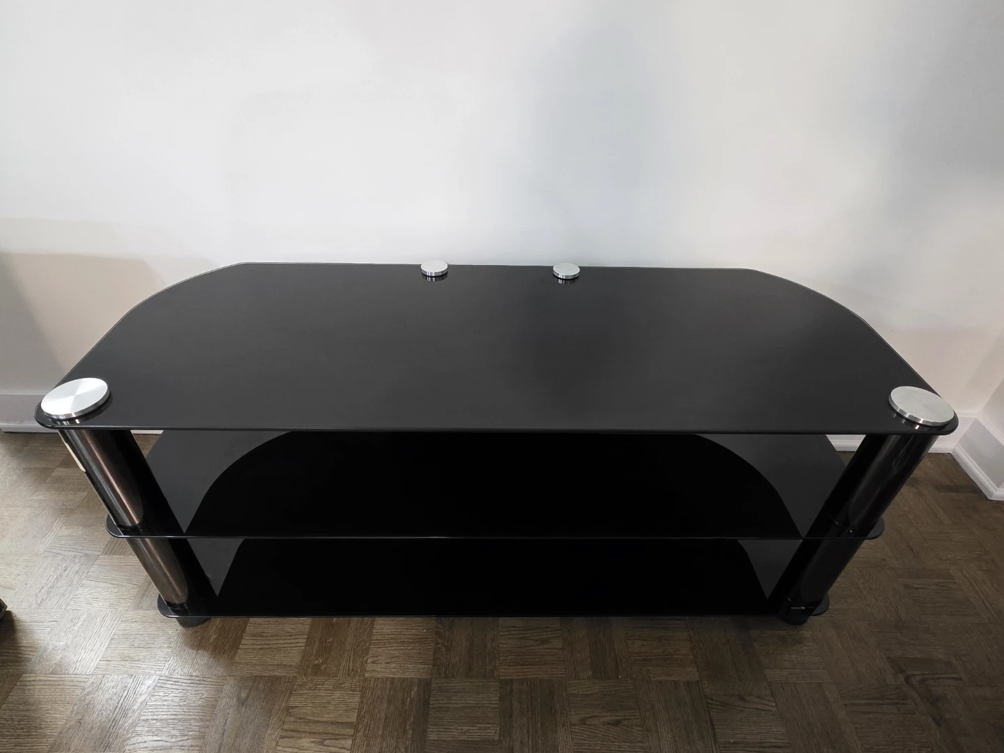 Black TV Stand w/ Glass Surface and Silver Metal Stand