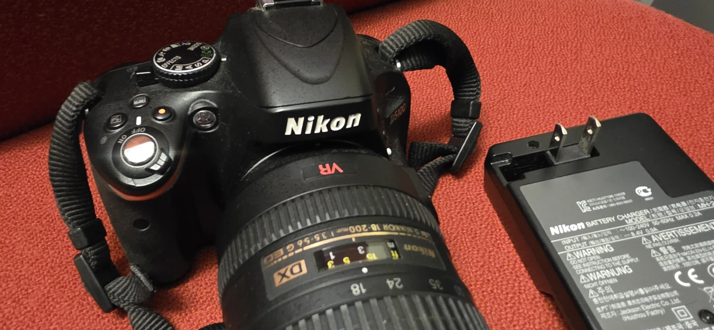 Nikon D5100 with 18-200 lens