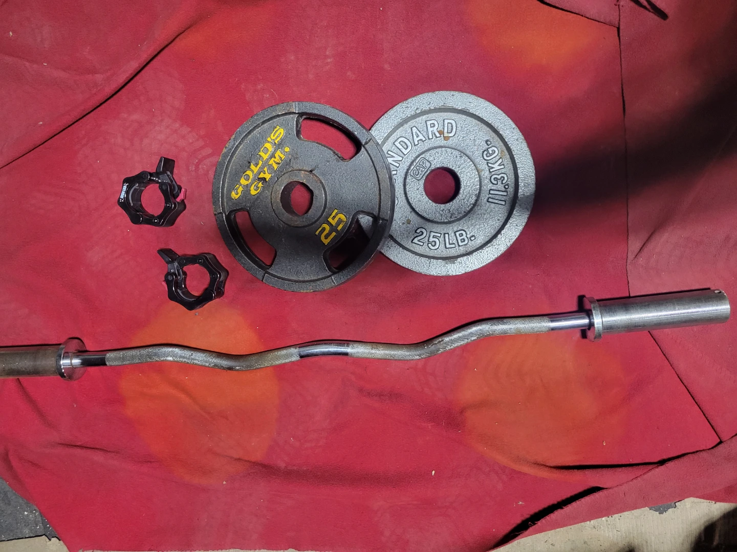 50LBs  2" HOLE OLYMPIC PLATES. 2-25s. DIFFERENT BRANDS