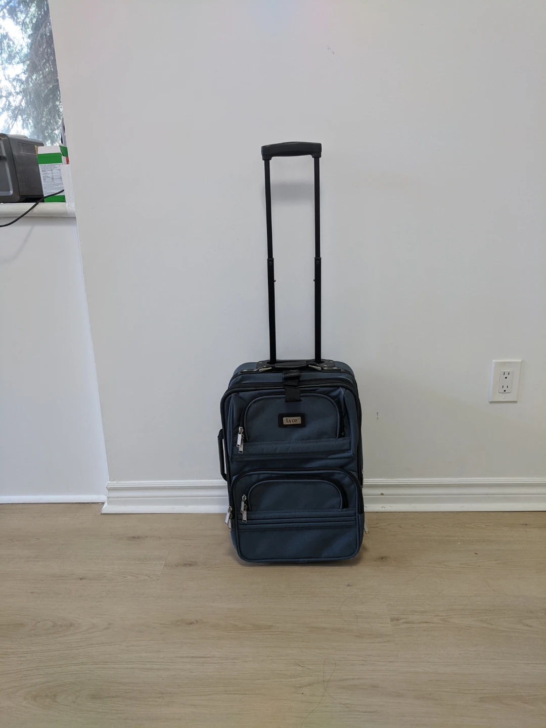 Carry-On Rolling Suitcase