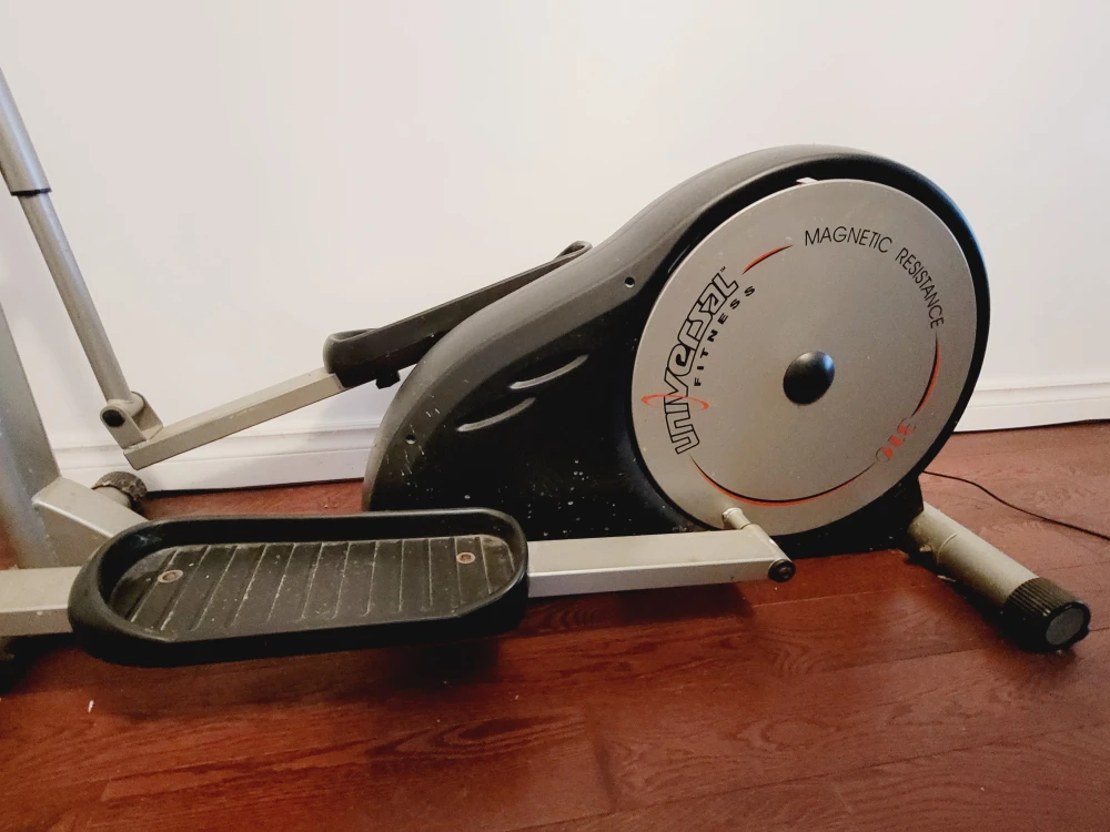 Universal Fitness elliptical machine - photo 5